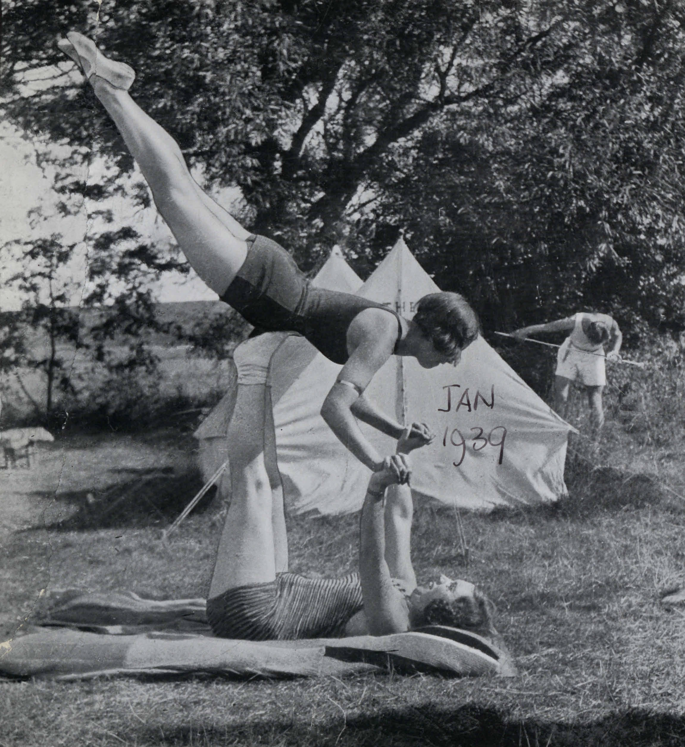 Two women performing gymnastics. From Block Records 1 [Photo Album]. Copyright The Camping and Caravanning Club Archive